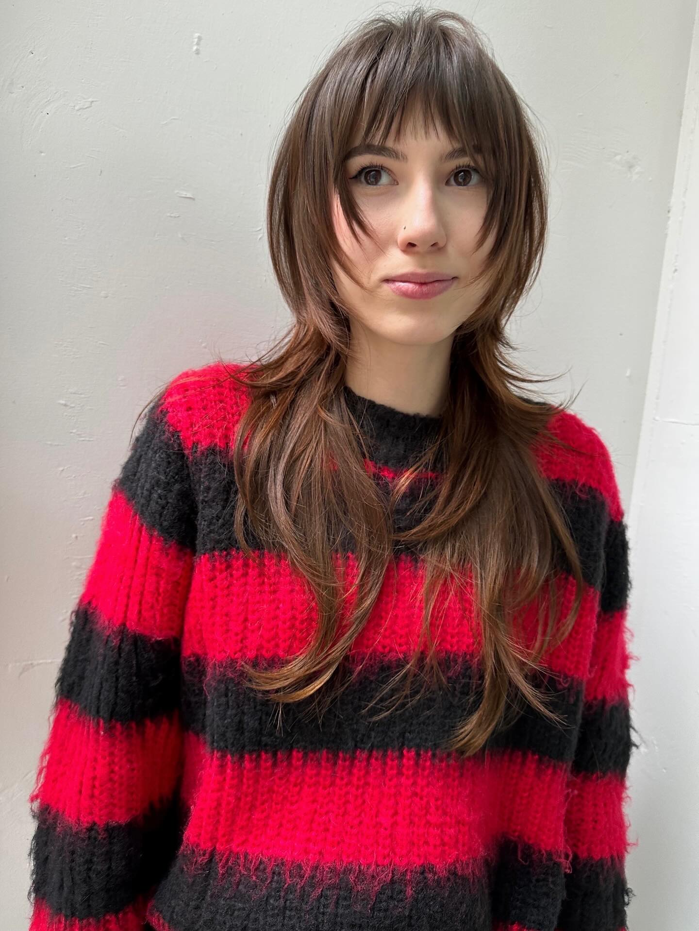 Effortless Chestnut Shag with Wispy Bangs