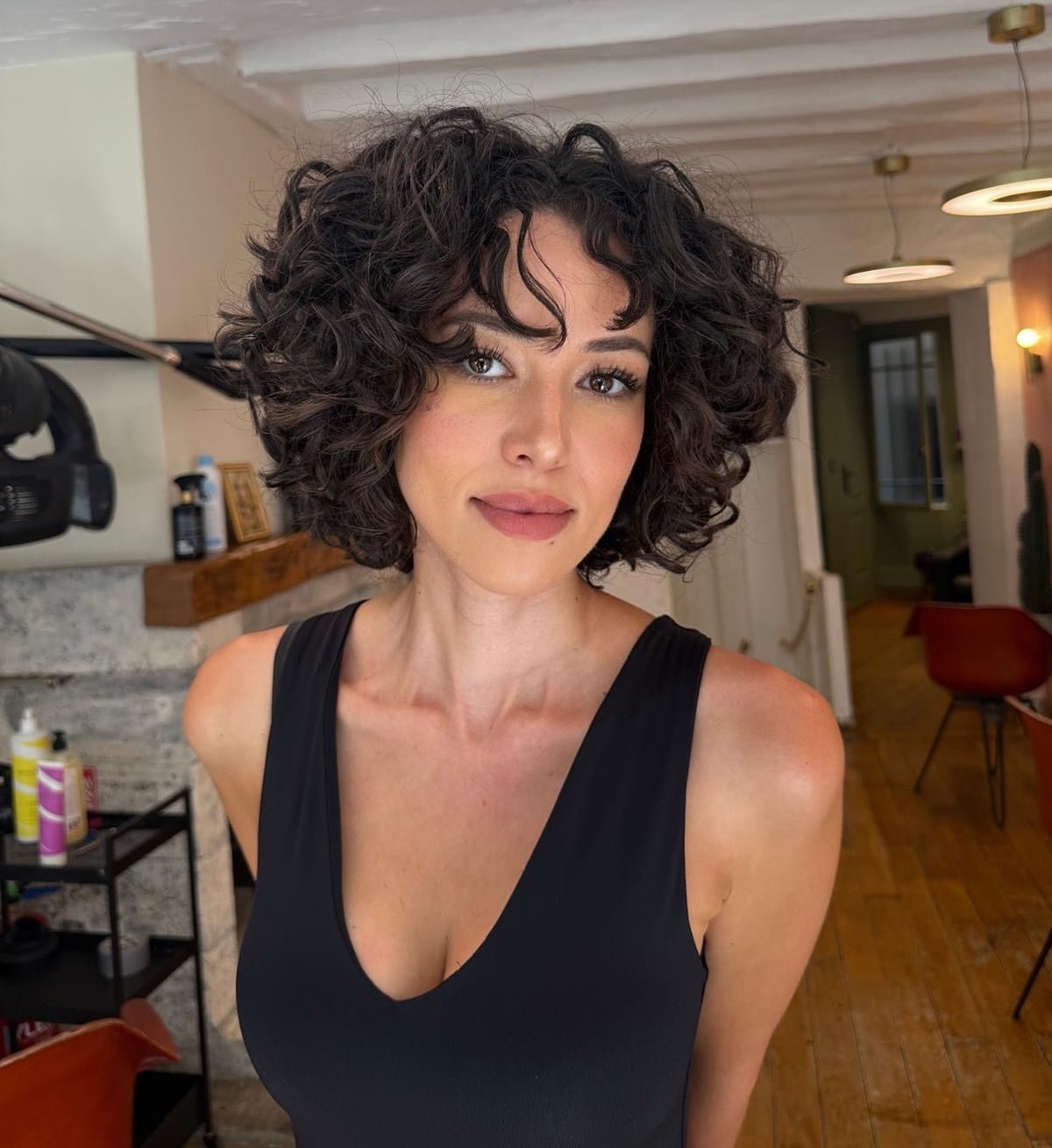 Effortless Short Brunette Curls with Soft Layers