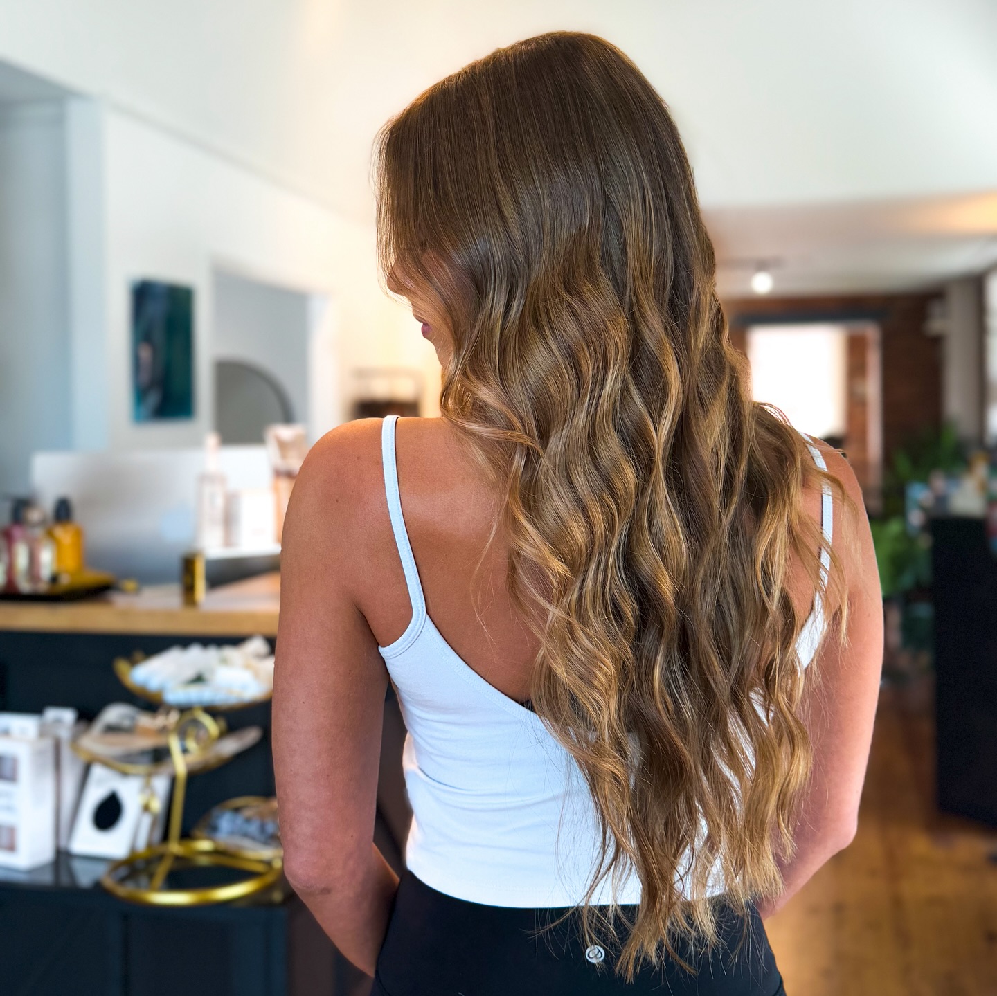 Flowing Caramel Waves with Subtle Balayage