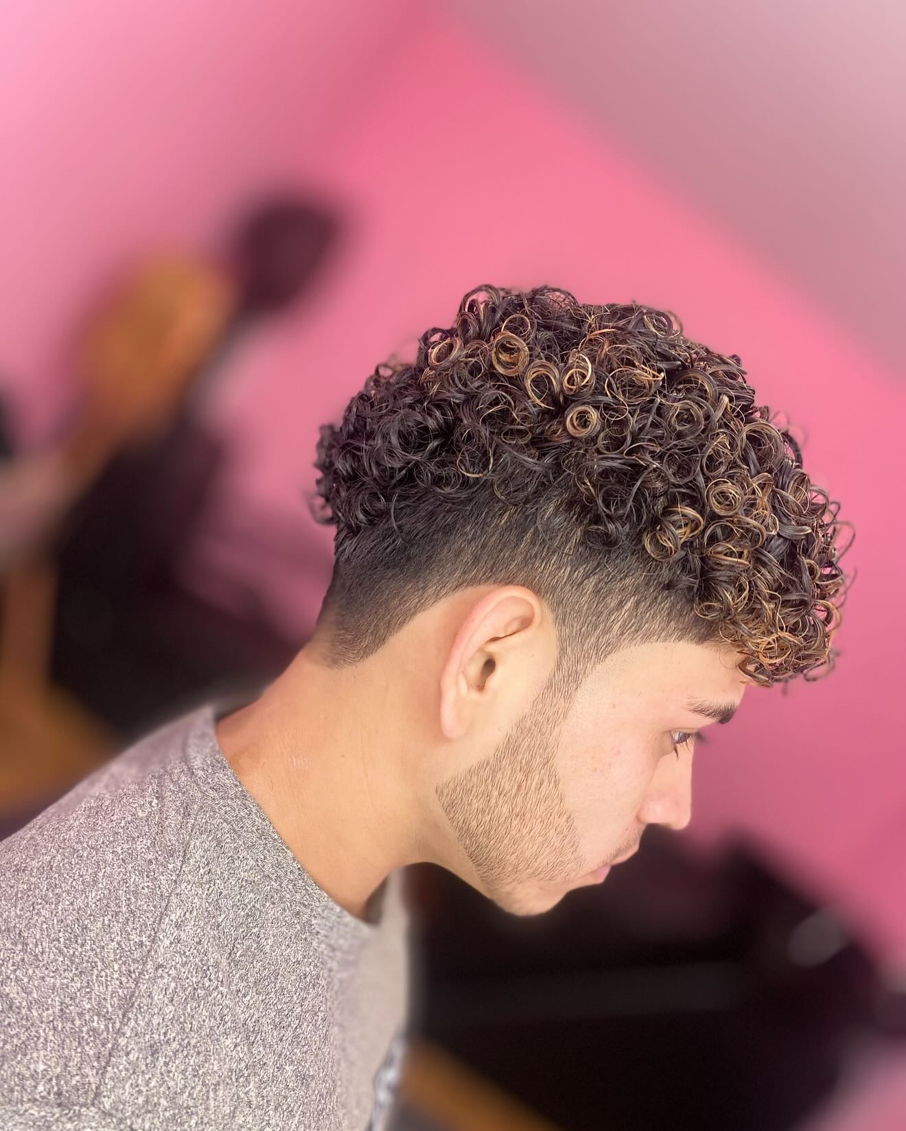 Refined Sharp Fade with Tightly Coiled Top