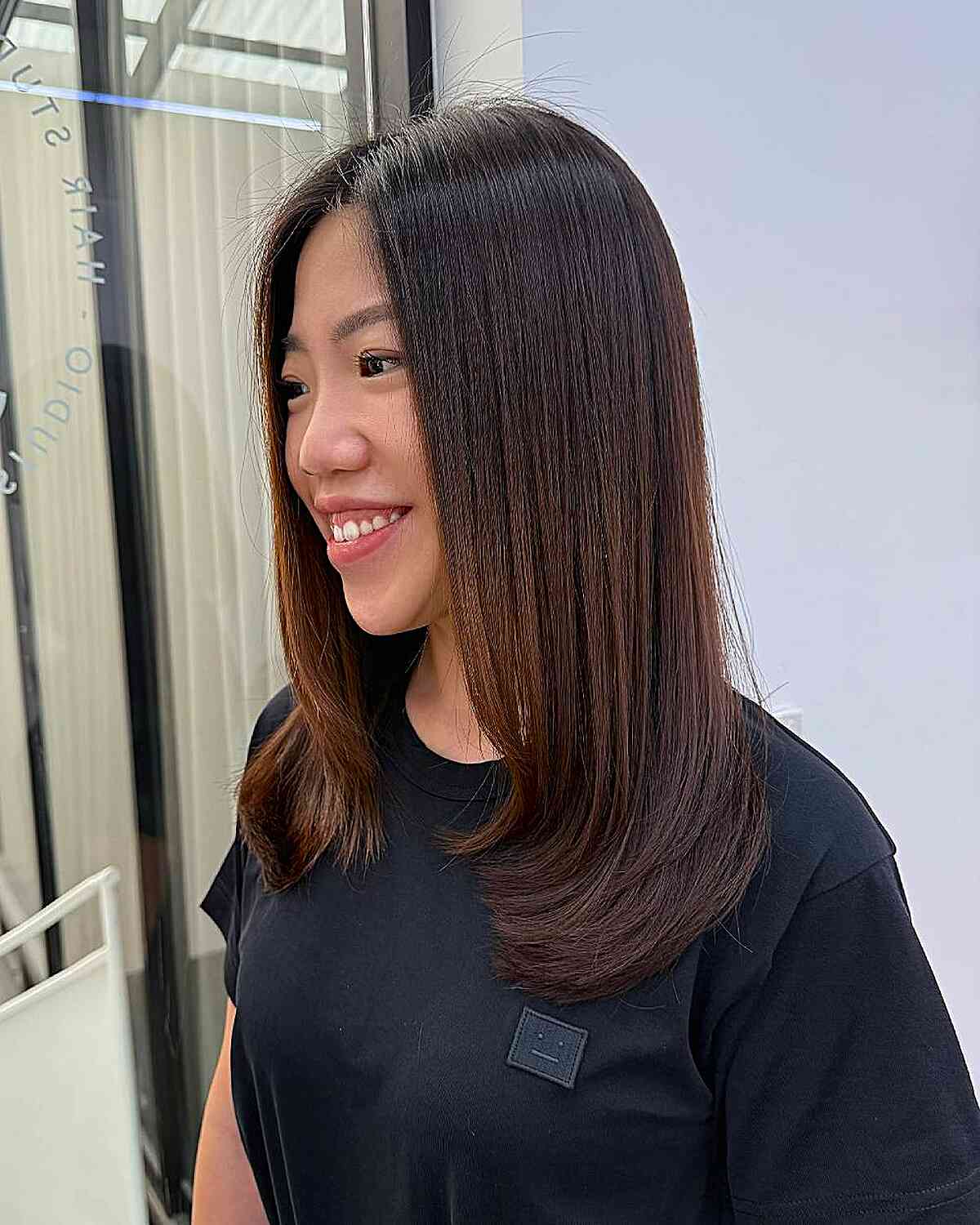Sleek Medium Length Haircut with Subtle Layers