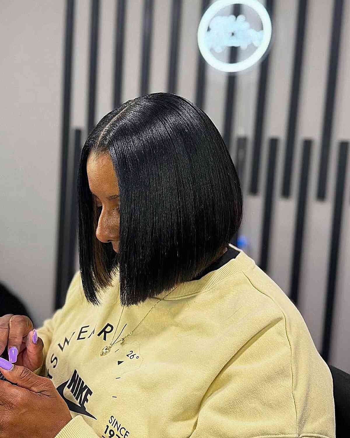 Sleek Middle Part Bob with Glossy Finish