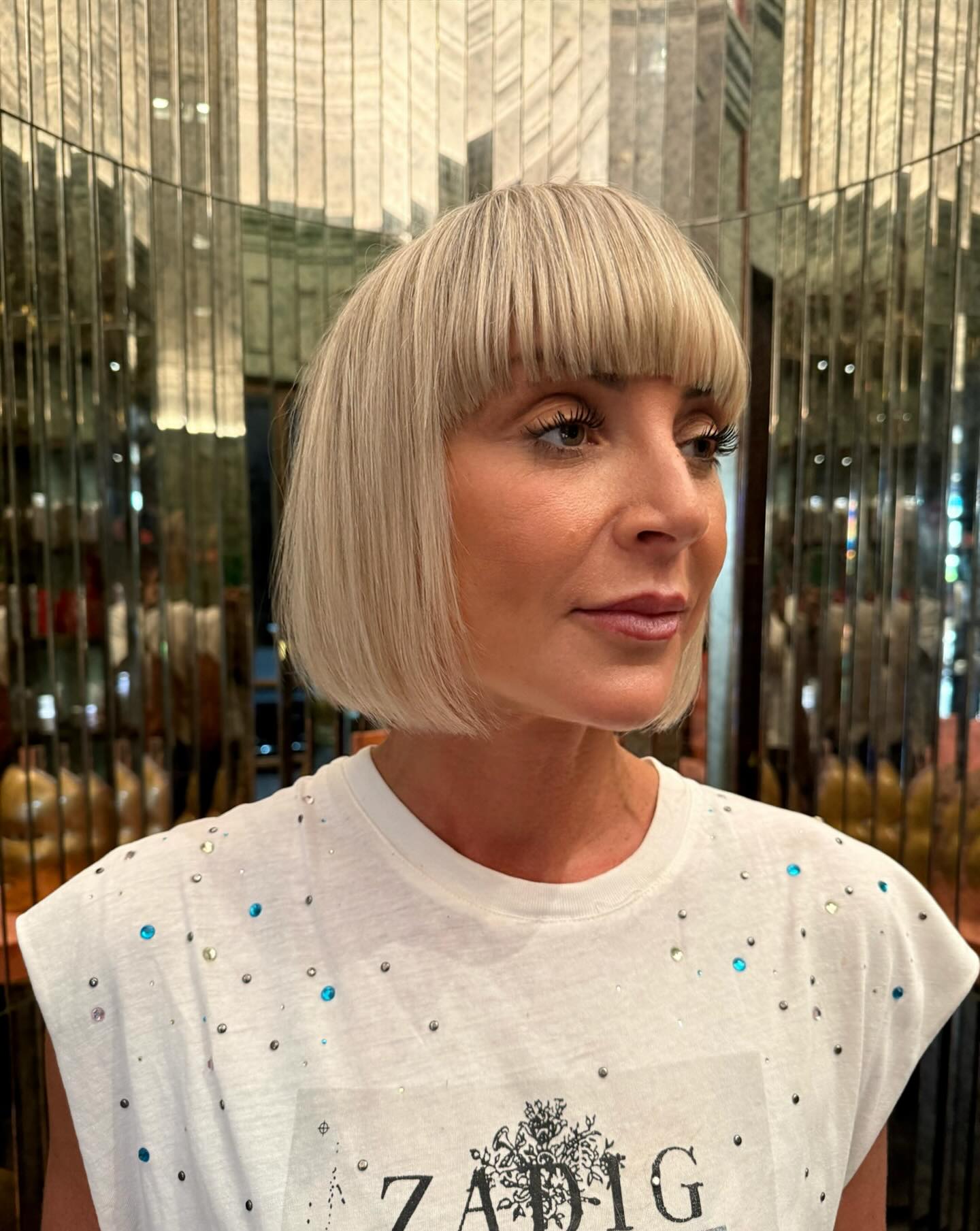 Sleek Platinum Bob with Precision Bangs