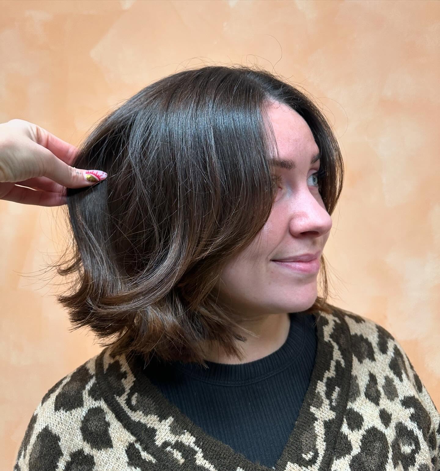 Softly Tousled Chestnut Bob with Subtle Highlights