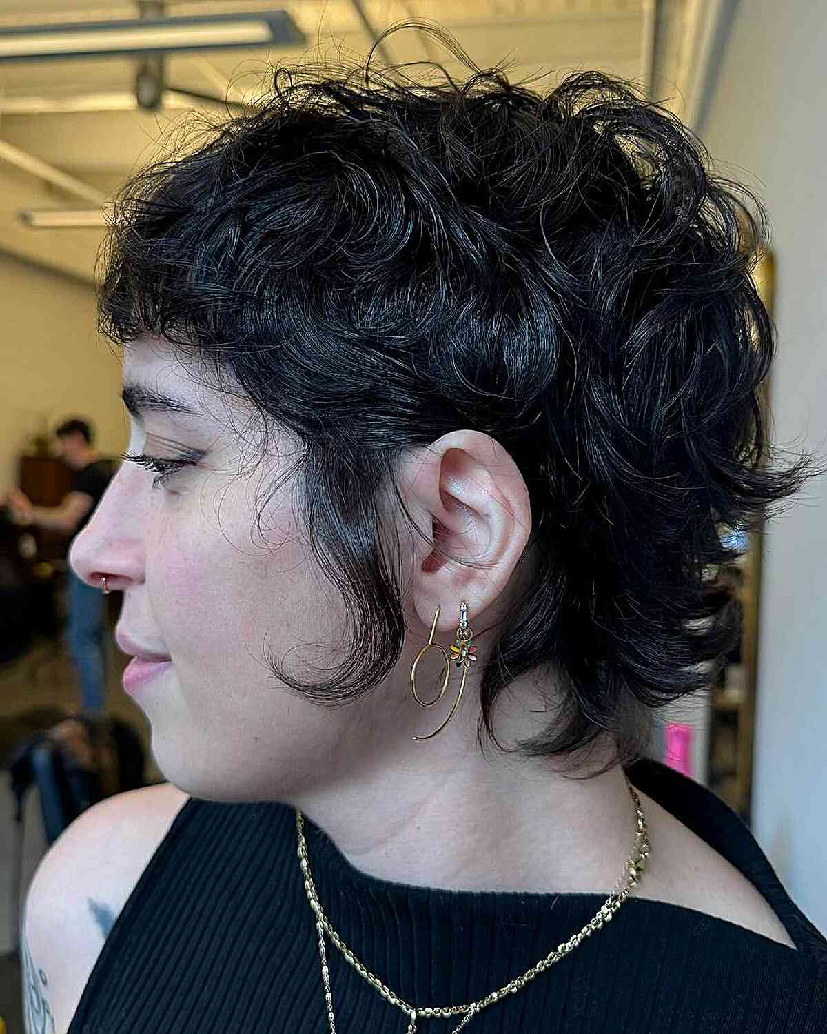 Textured Short Curly Cut with Soft Bangs