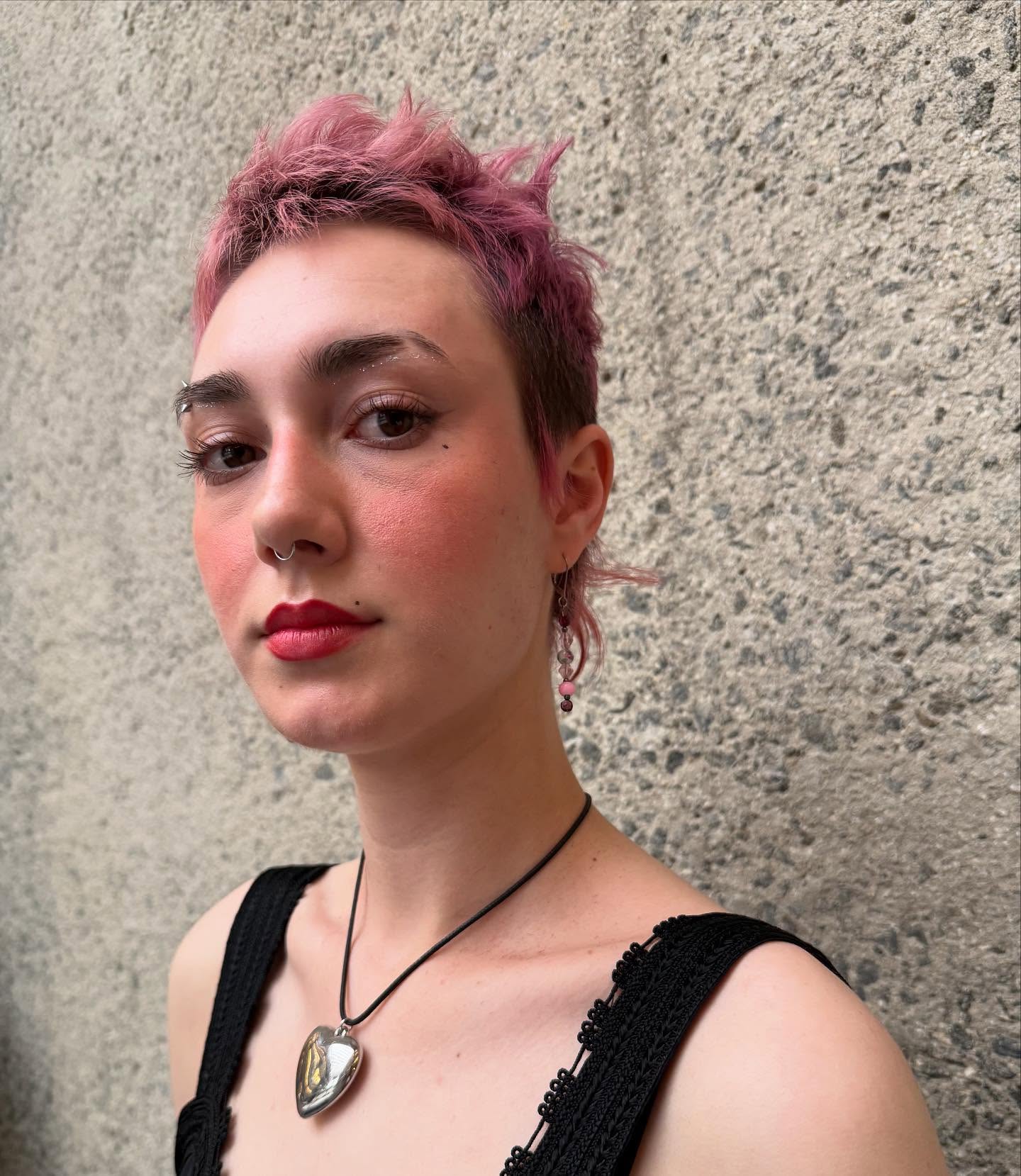 Trendy Short Textured Cut with Playful Pink Highlights