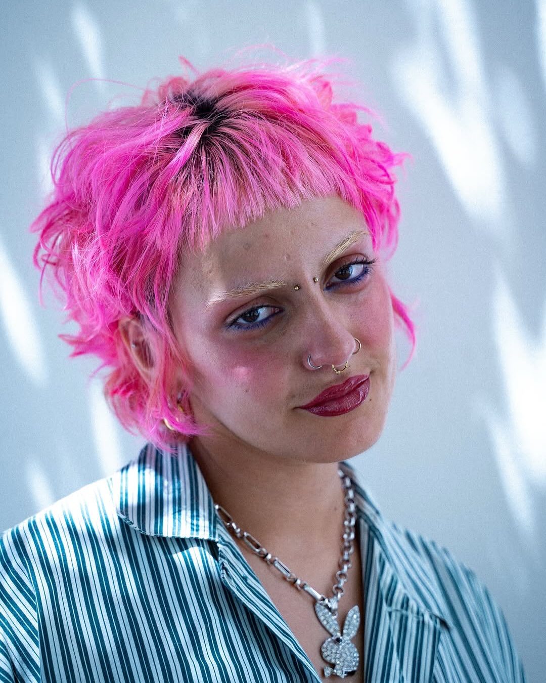 Vibrant Pink Textured Crop with Razor-Cut Bangs