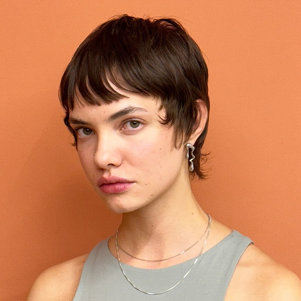 Bold Brunette Pixie with Delicate Bangs
