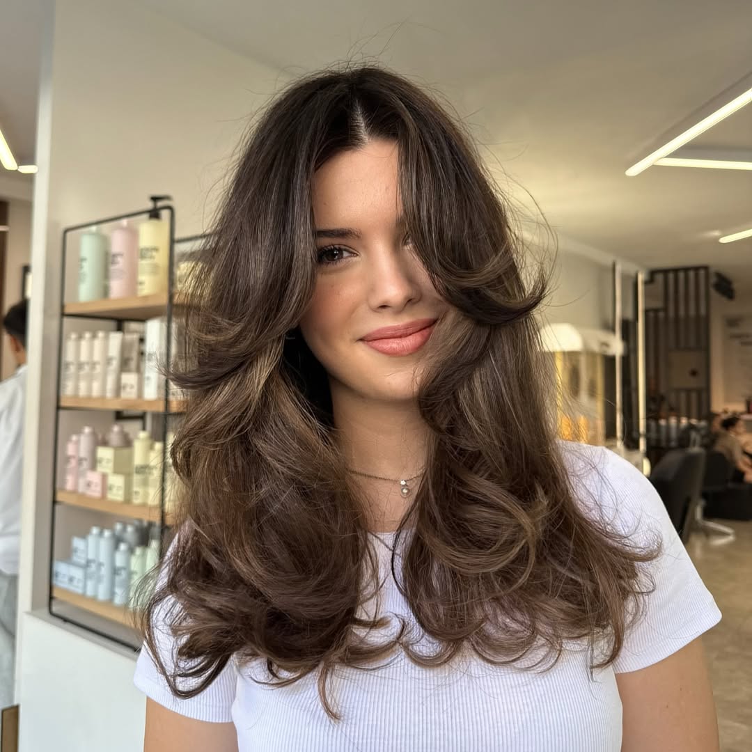 Brunette Cascading Layers with Voluminous Curtain Bangs
