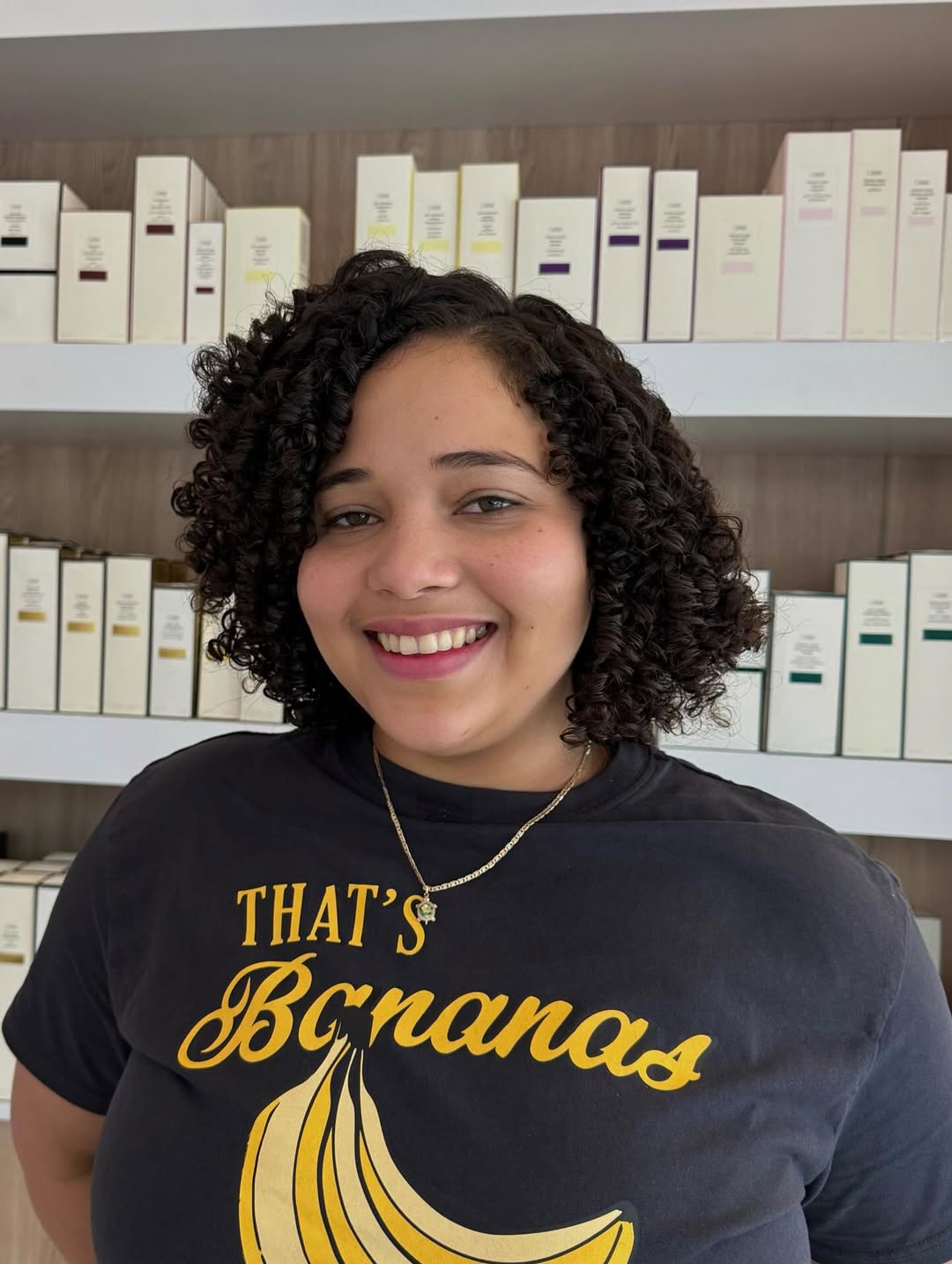 Charming Chestnut Curls with Luminous Highlights