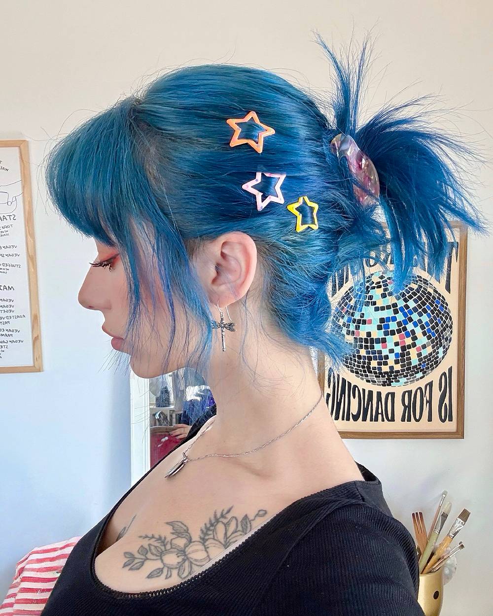 Chic Blue Ponytail with Playful Star Clips