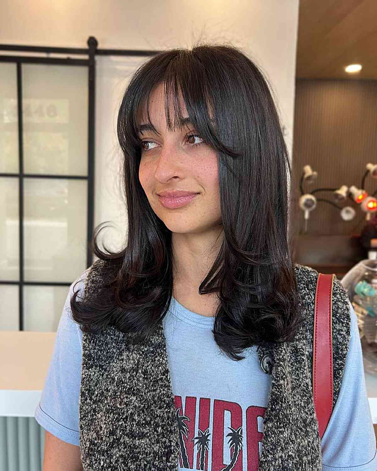 Chic Long Layered Cut with Face-Framing Bangs