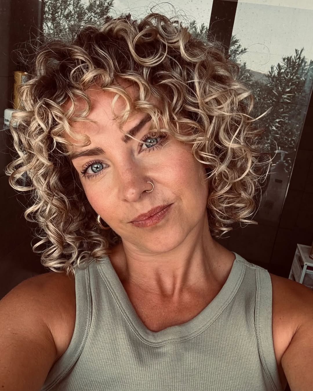 Curly Blonde Bob with Tousled Texture