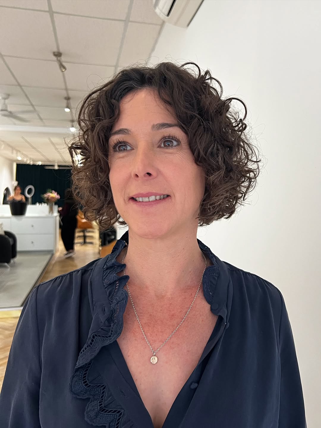 Deep-Chocolate-Curly-Bob-with-Natural-Volume