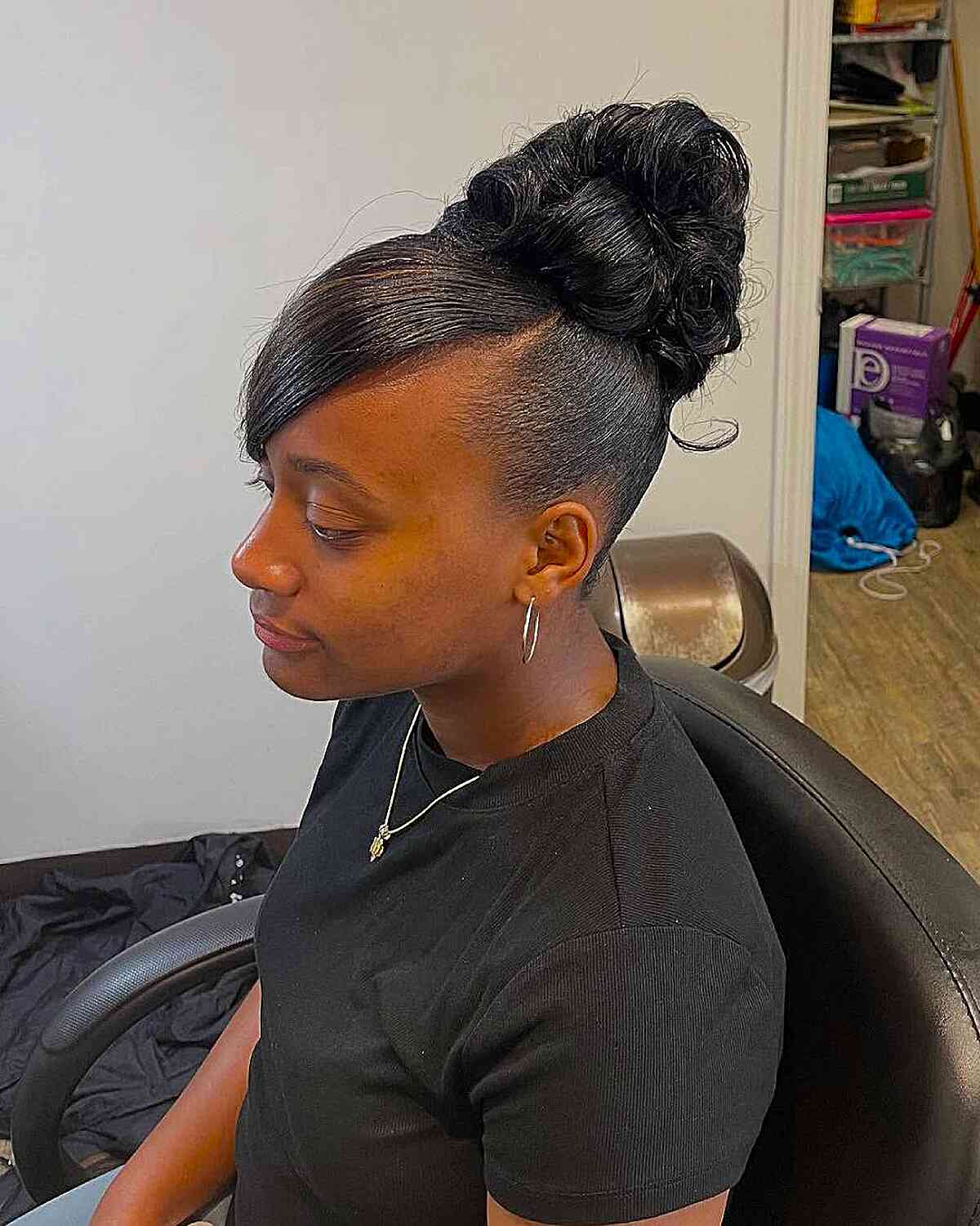 Elegant Black Updo with Side Bangs