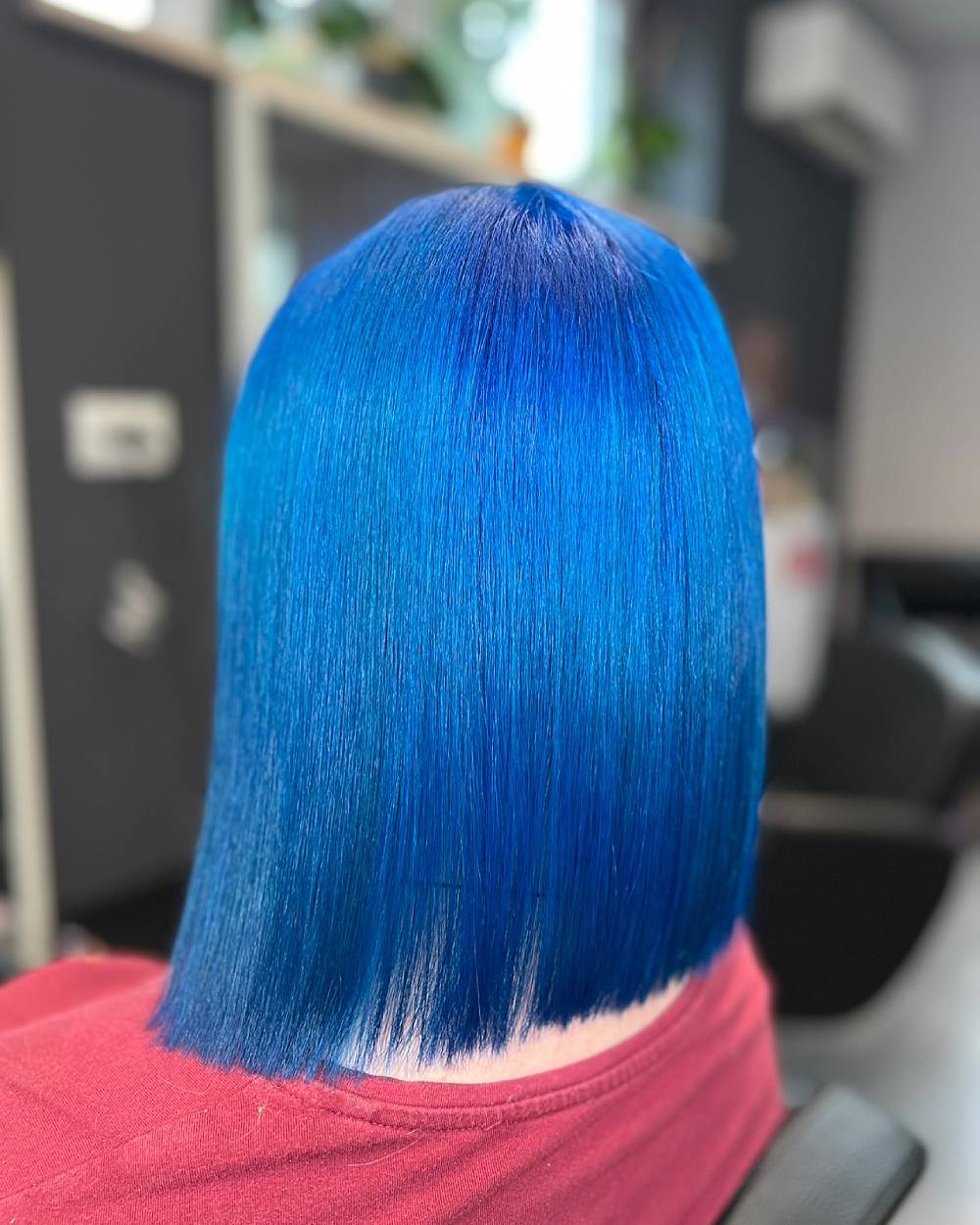 Glossy Blue Blunt Bob with Sleek Finish