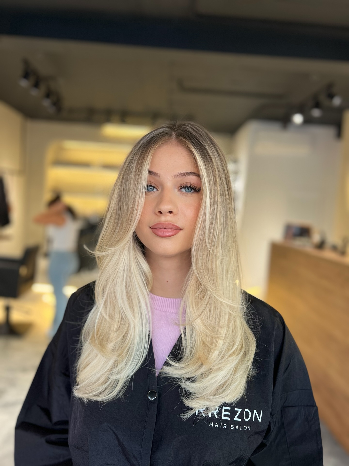 Glossy Vanilla Blonde Feathered Layers