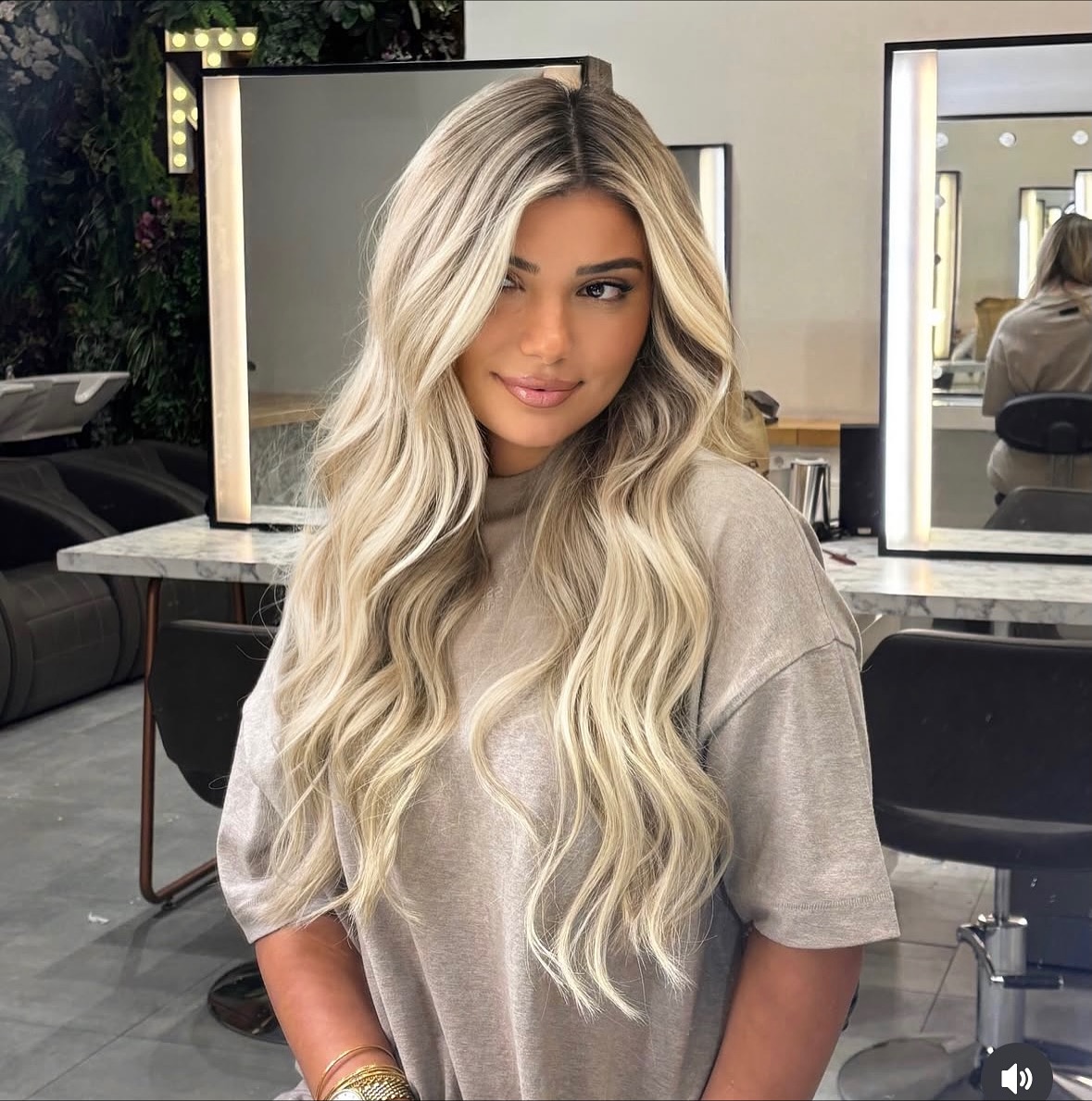 Luminous Blonde Waves with Seamless Face-Framing
