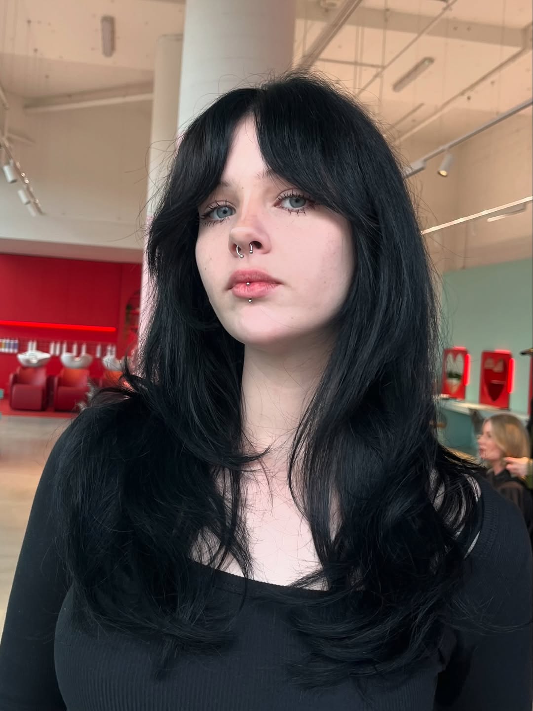 Lustrous Black Waves with Sleek Curtain Bangs