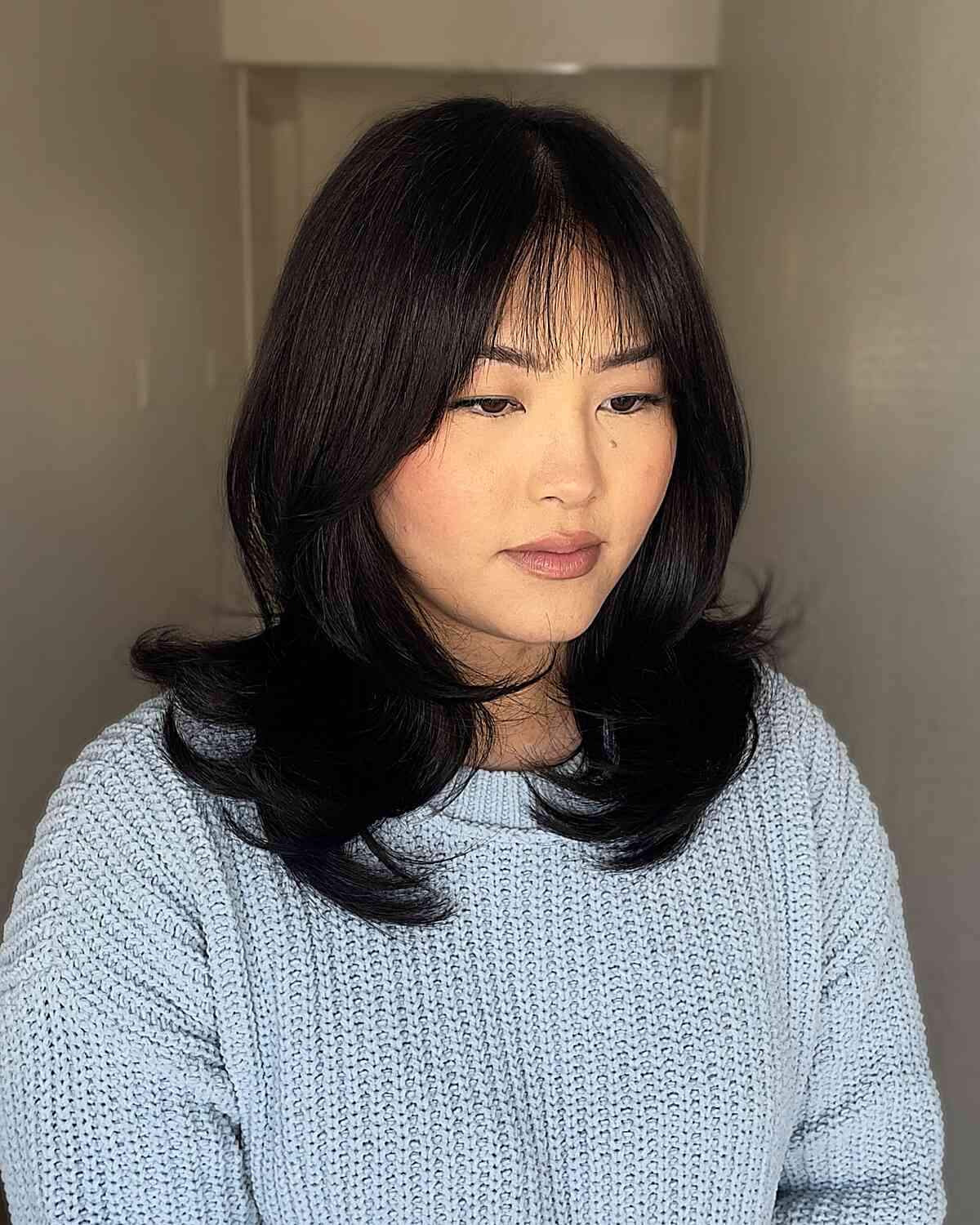 Modern Wispy Bangs with Layered Ends
