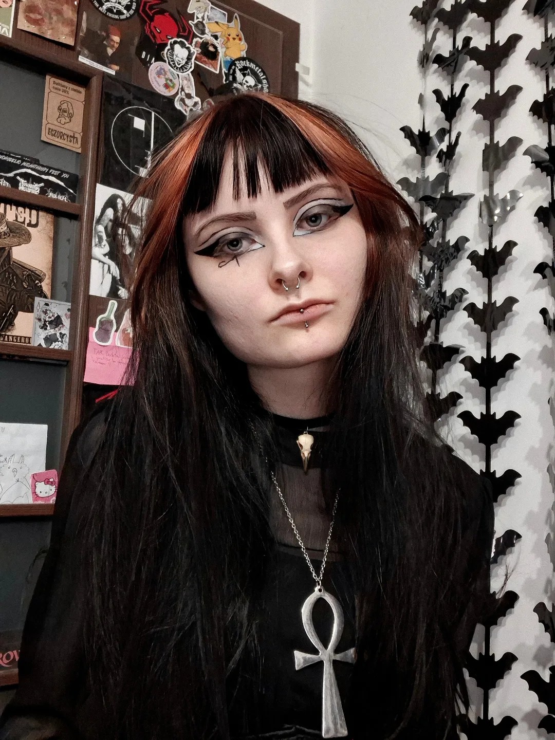 Sleek Black and Auburn Layered Cut with Bold Bangs