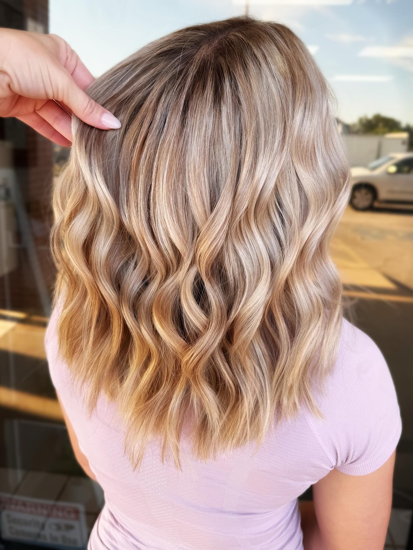 Soft Ash Blonde Balayage with Gentle Waves