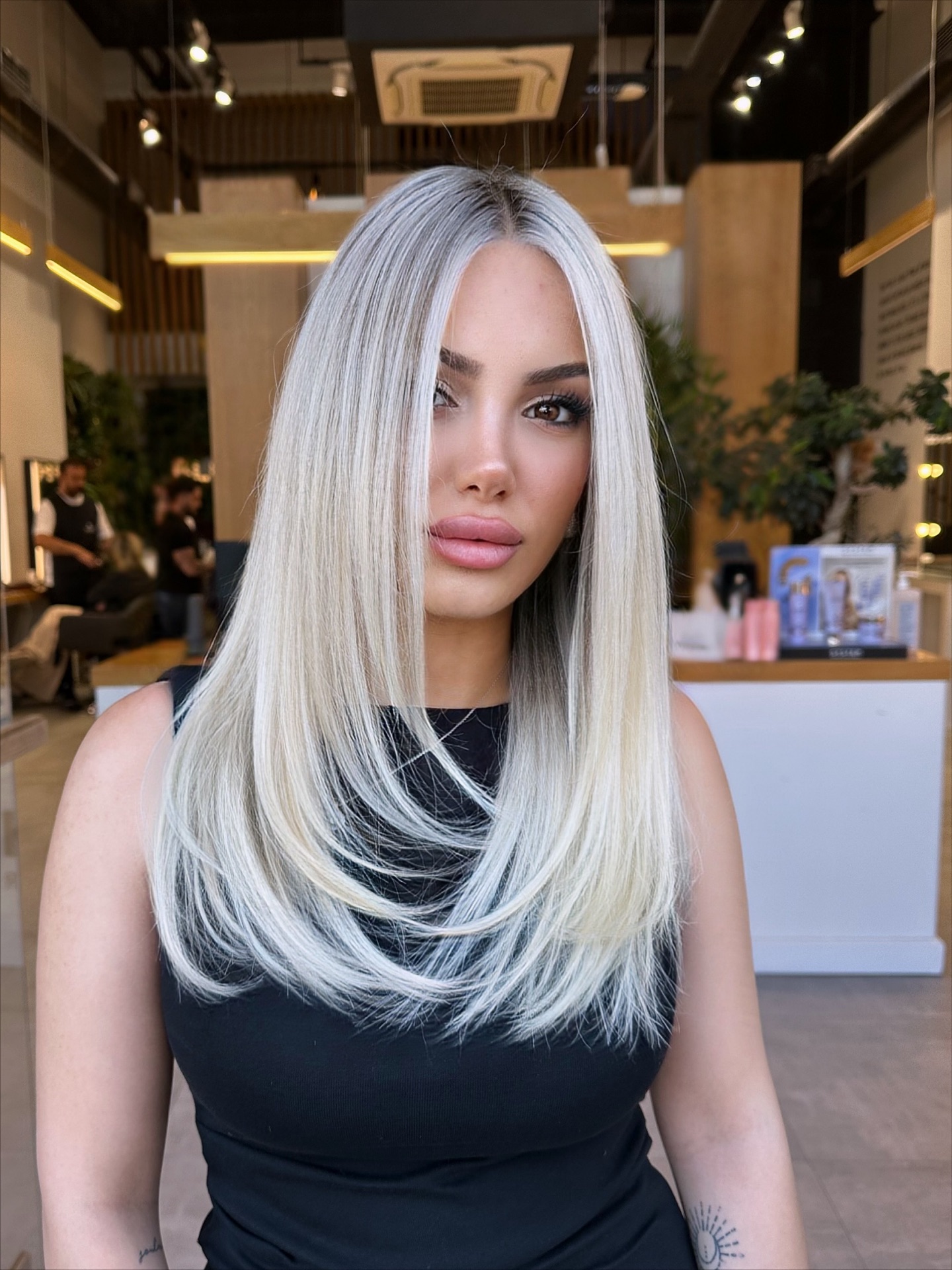 Striking Contrast Full-Bodied Blonde with Charcoal Highlights