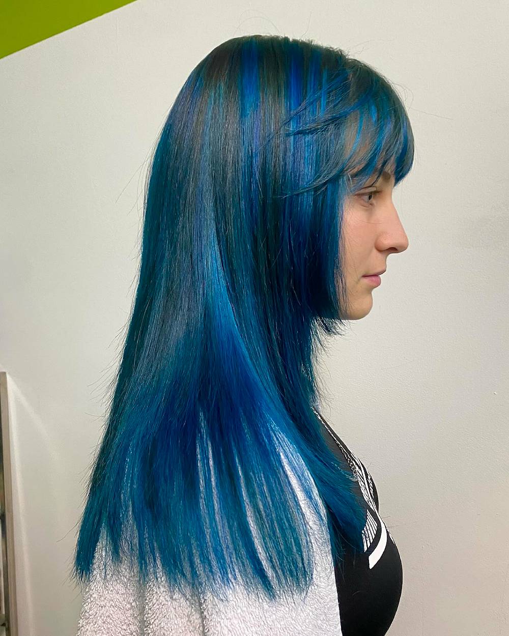 Striking Long Blue Hair with Textured Bangs