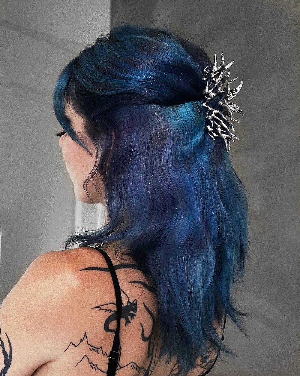 Stylish Blue-Hued Textured Lob with Unique Accessory