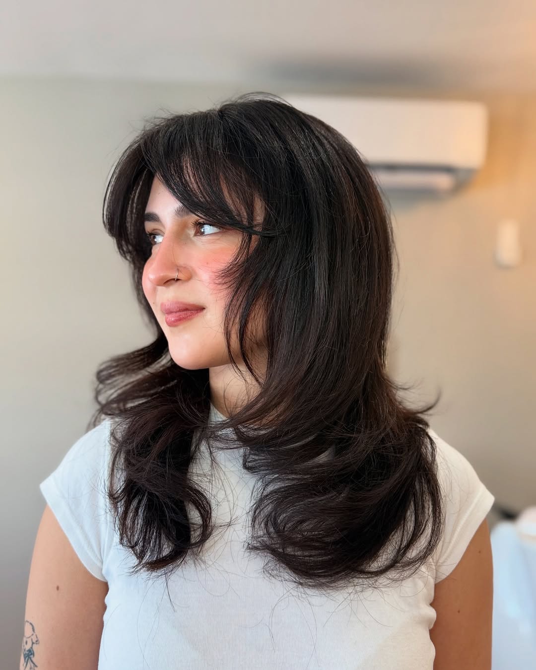 Effortless Raven Layers with Whimsical Fringe