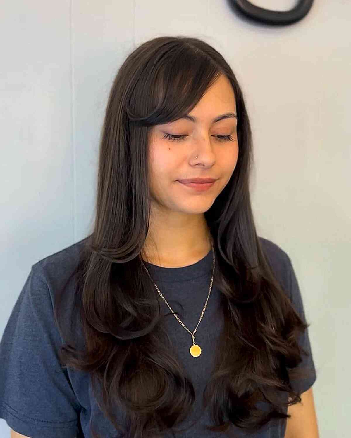 Long Layered Waves with Face-Framing Bangs