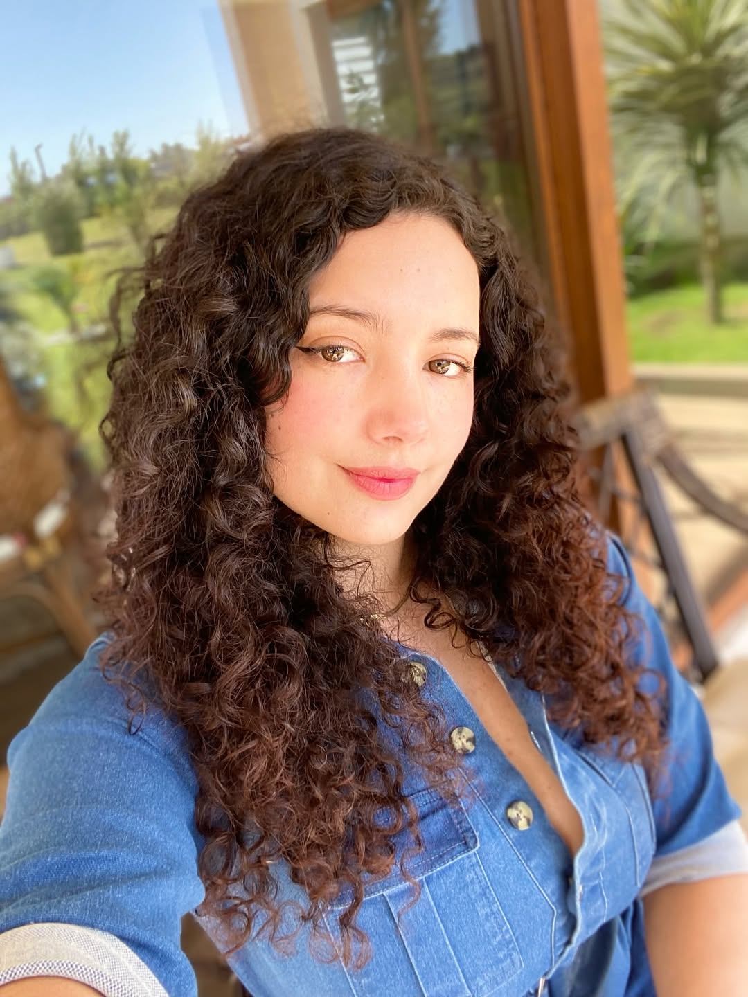 Lustrous Deep Brown Curls With Gentle Highlights