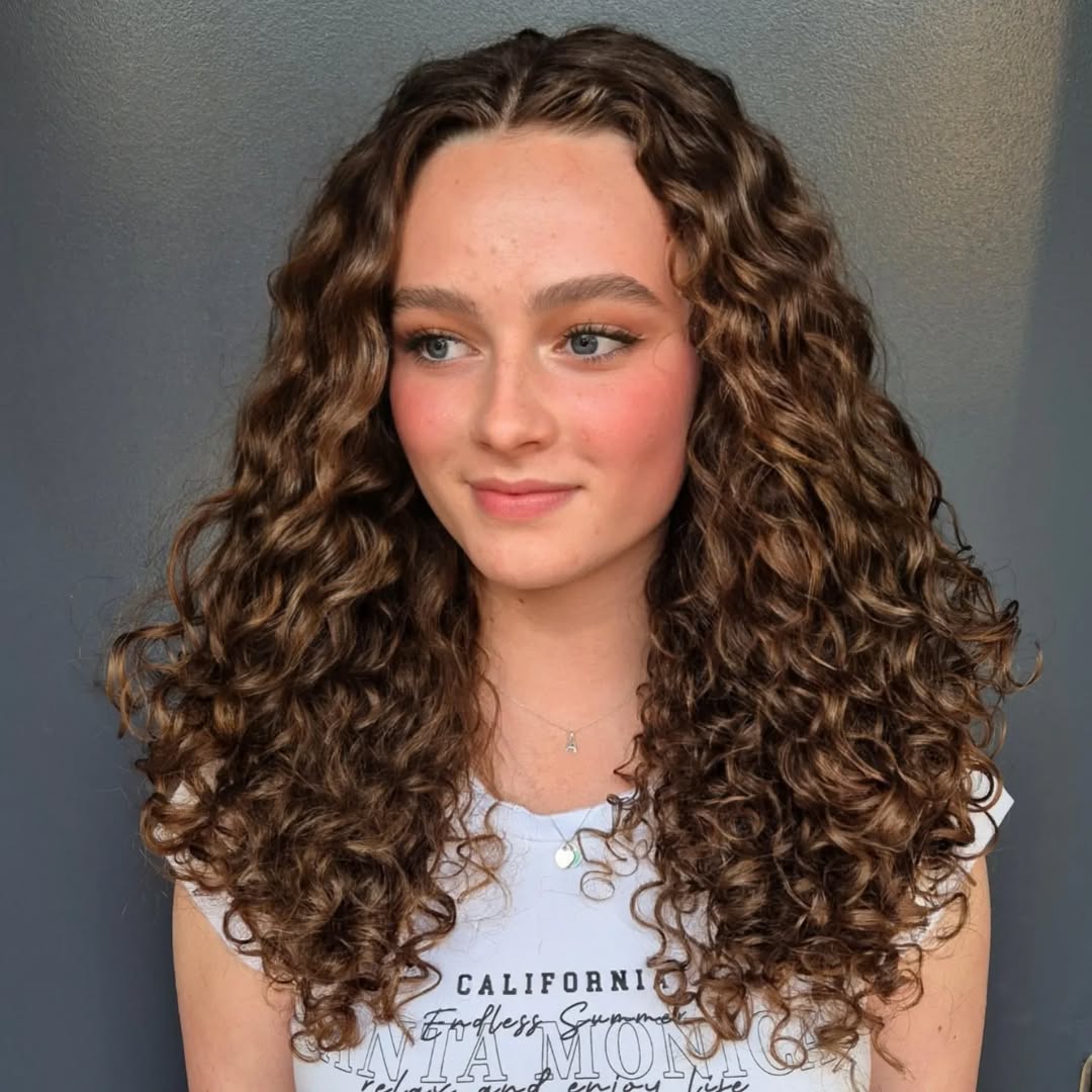 Luxuriant Chestnut Curls with Voluminous Texture
