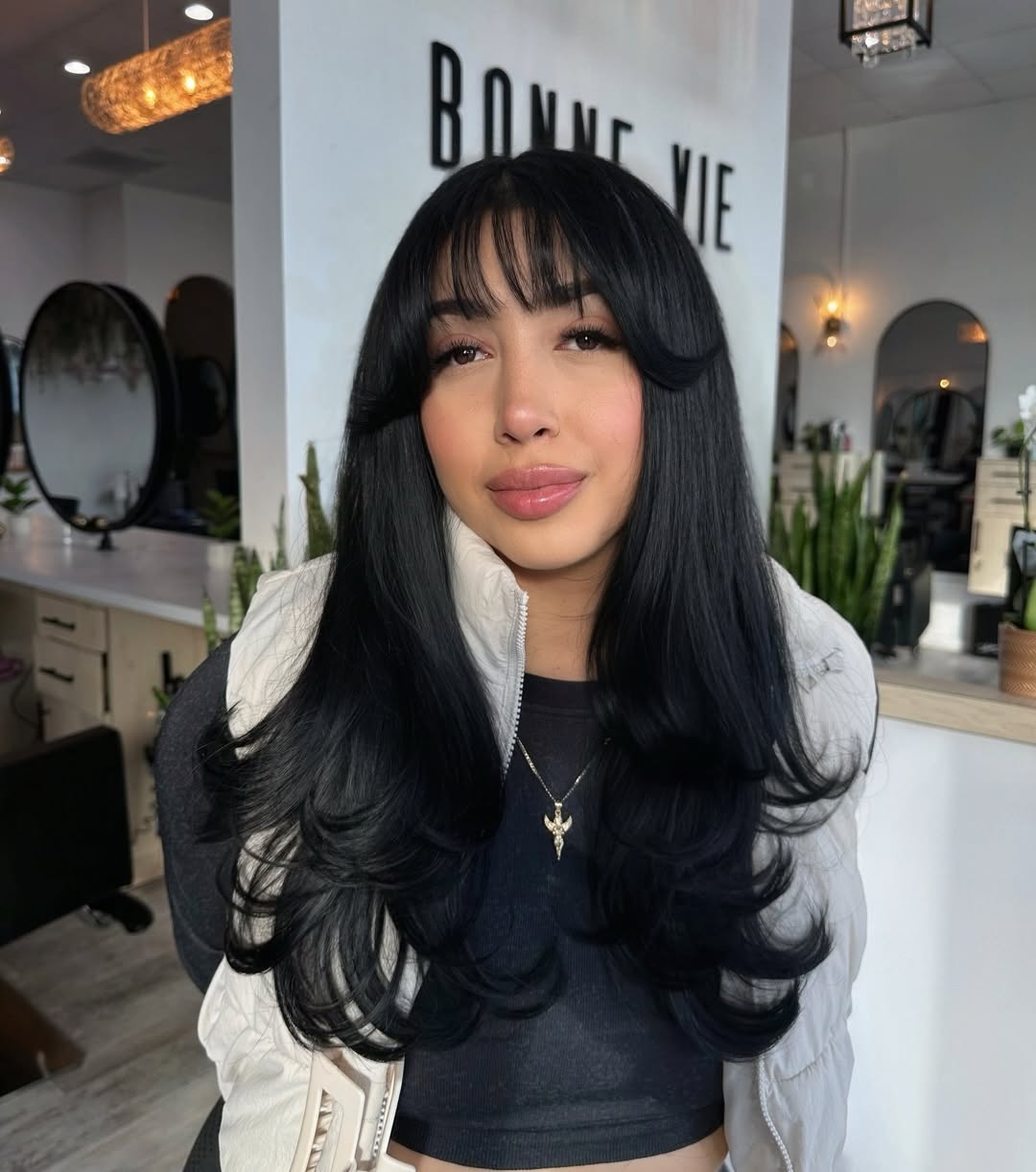 Luxurious-Long-Black-Layers-with-Sleek-Wispy-Bangs