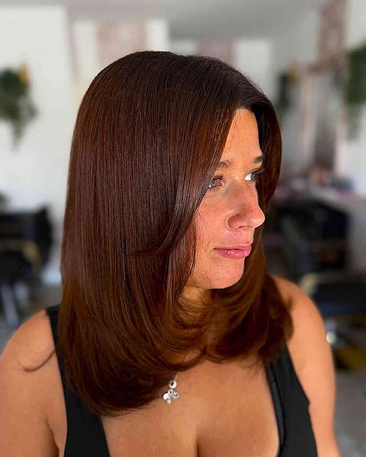 Sleek Auburn Long Layered Cut