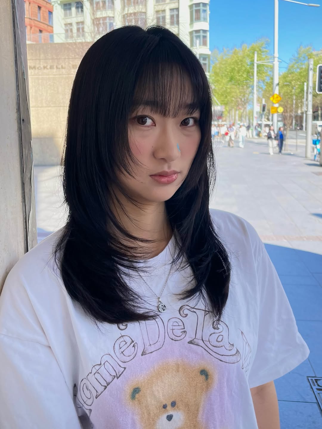 Sleek Jet-Black Bob with Wispy Bangs