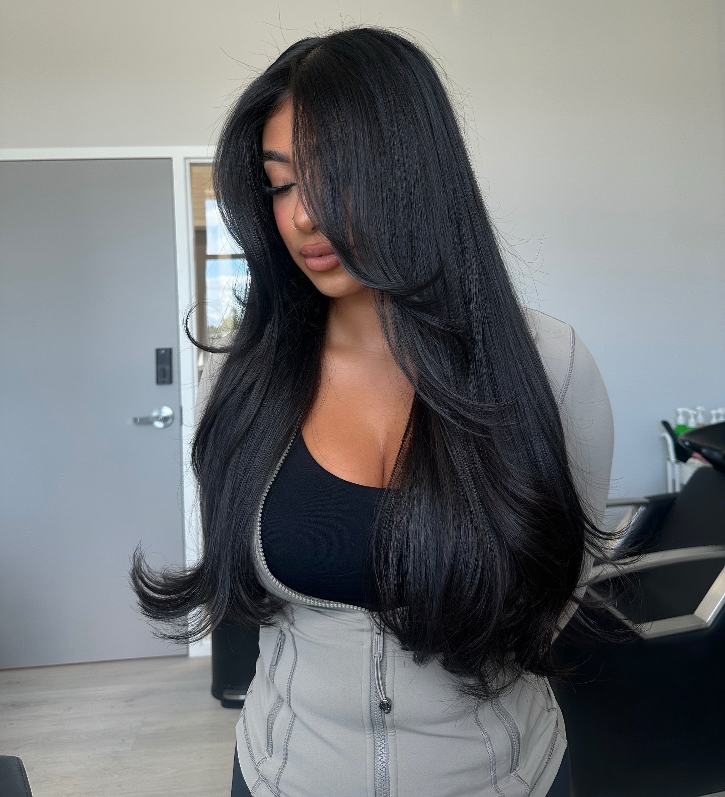 Sleek Jet Black Layers with a Feathered Finish