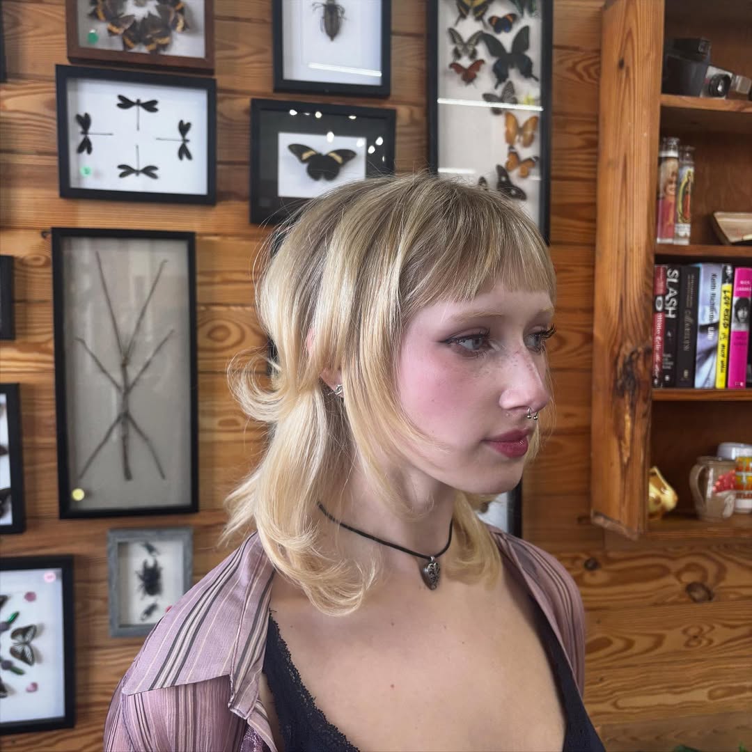 Soft Blonde Waves with Curtain Bangs