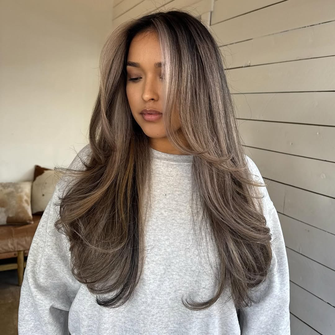 Subtle Ash-Blonde Layering on Long Dense Hair