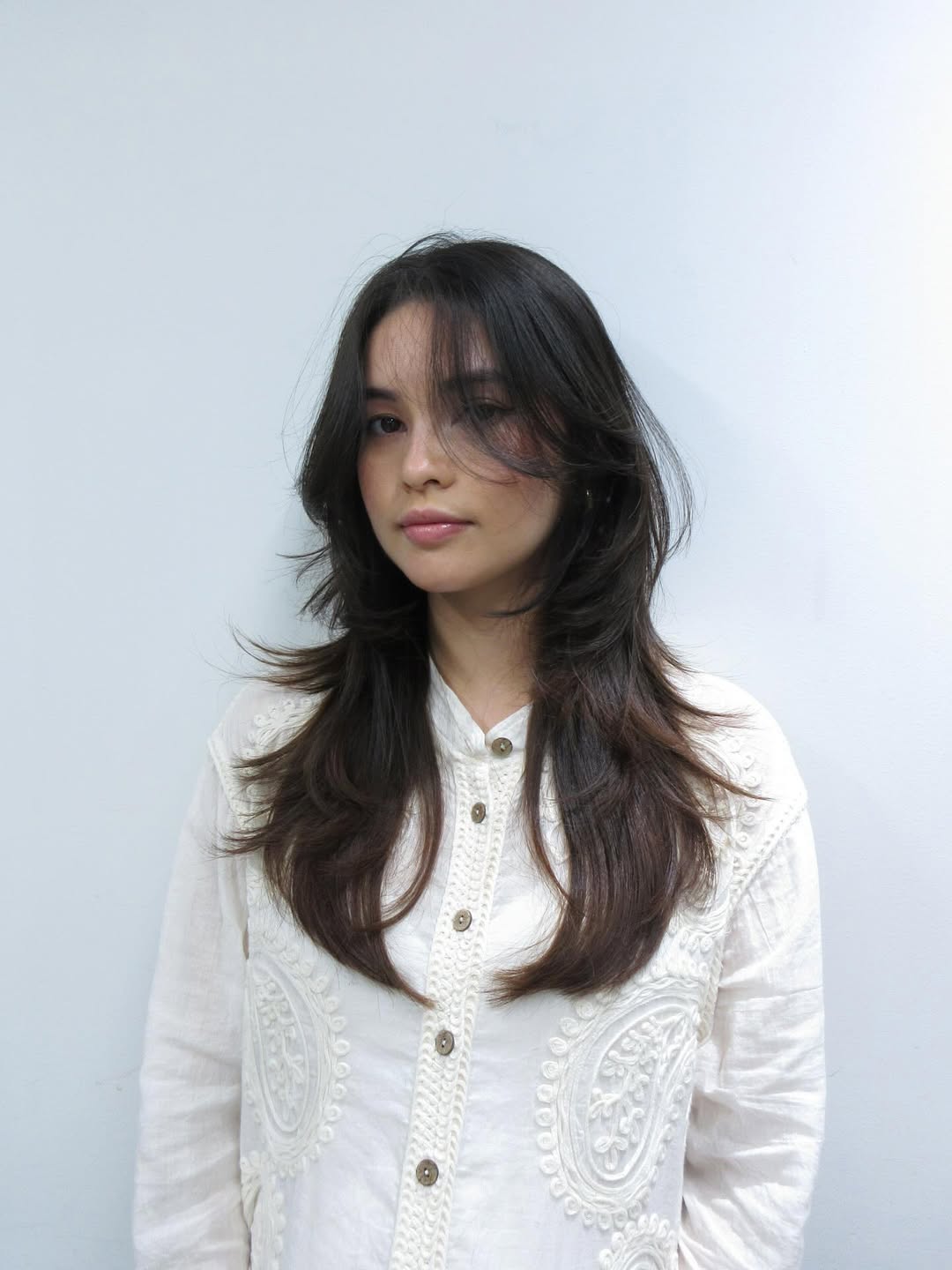 Subtle Mocha Curls with Gentle Face-Framing