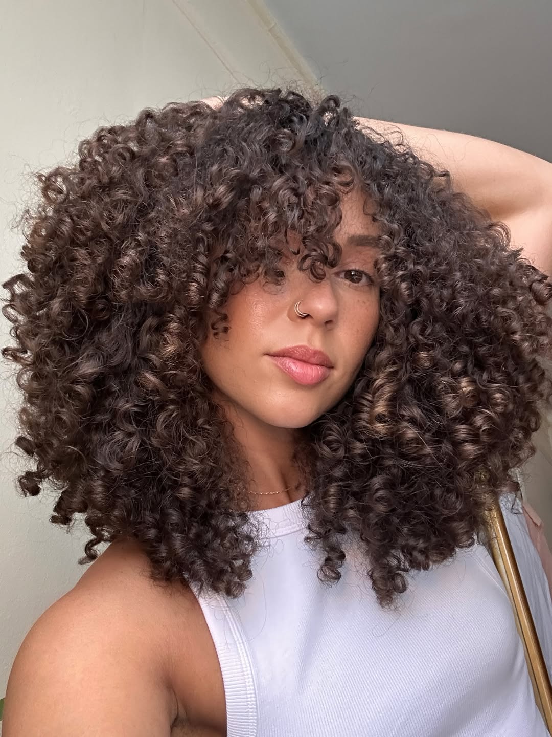 Sumptuous Chestnut Curly Shag with Balayage Highlights