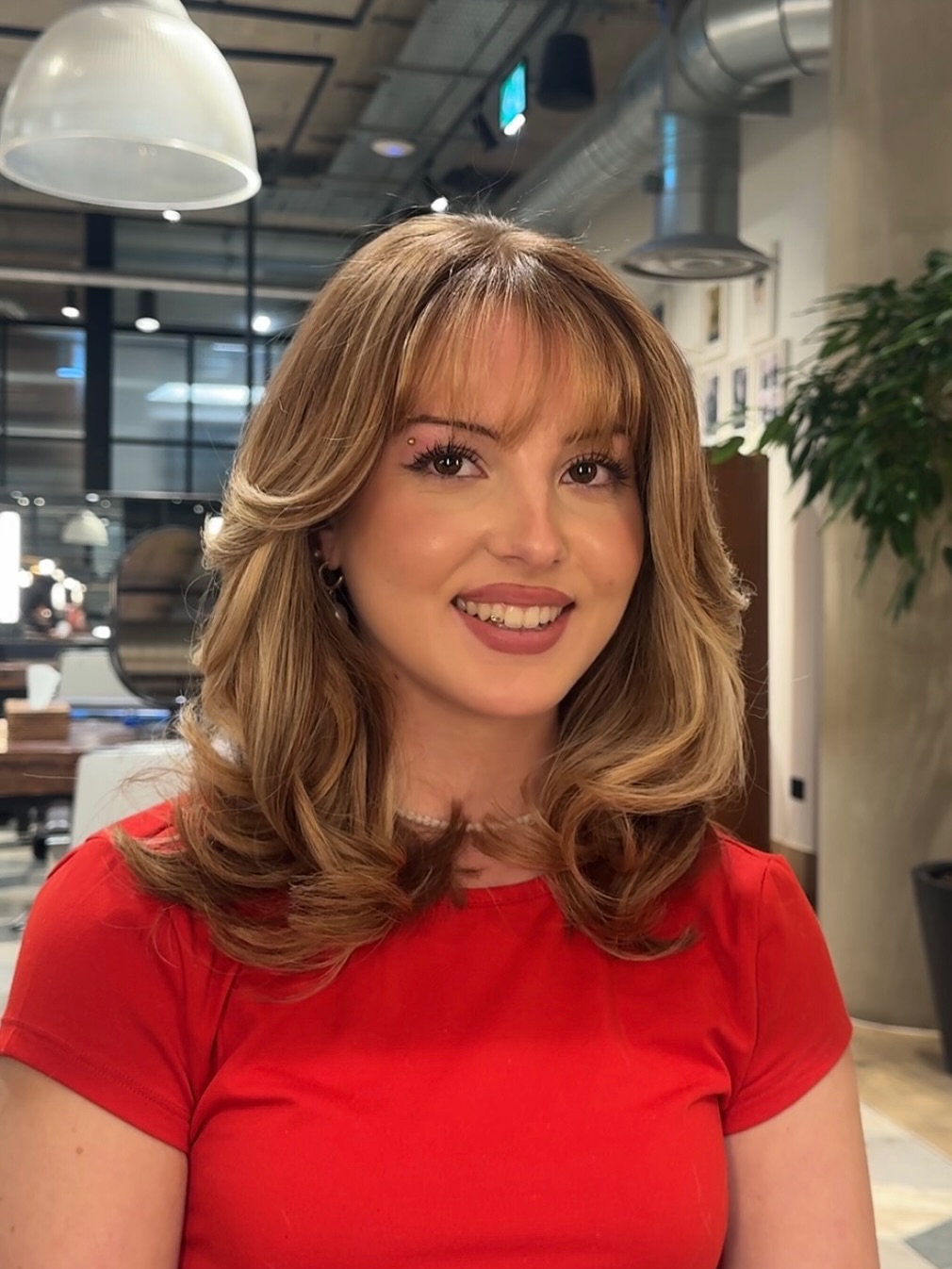 Sunny-Blonde-Layers-with-Sweeping-Fringe