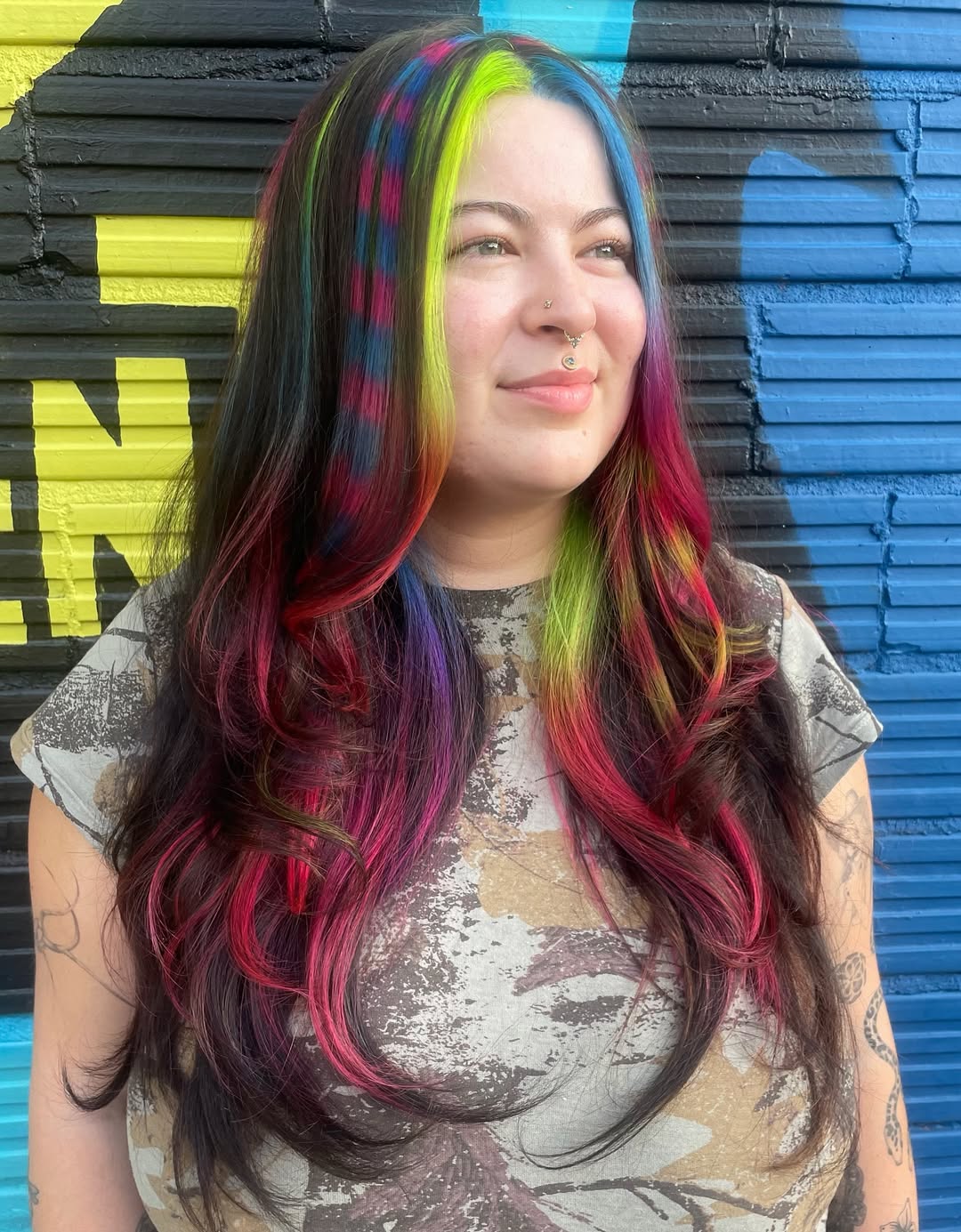 Whimsical Rainbow Streaks on Long Curls