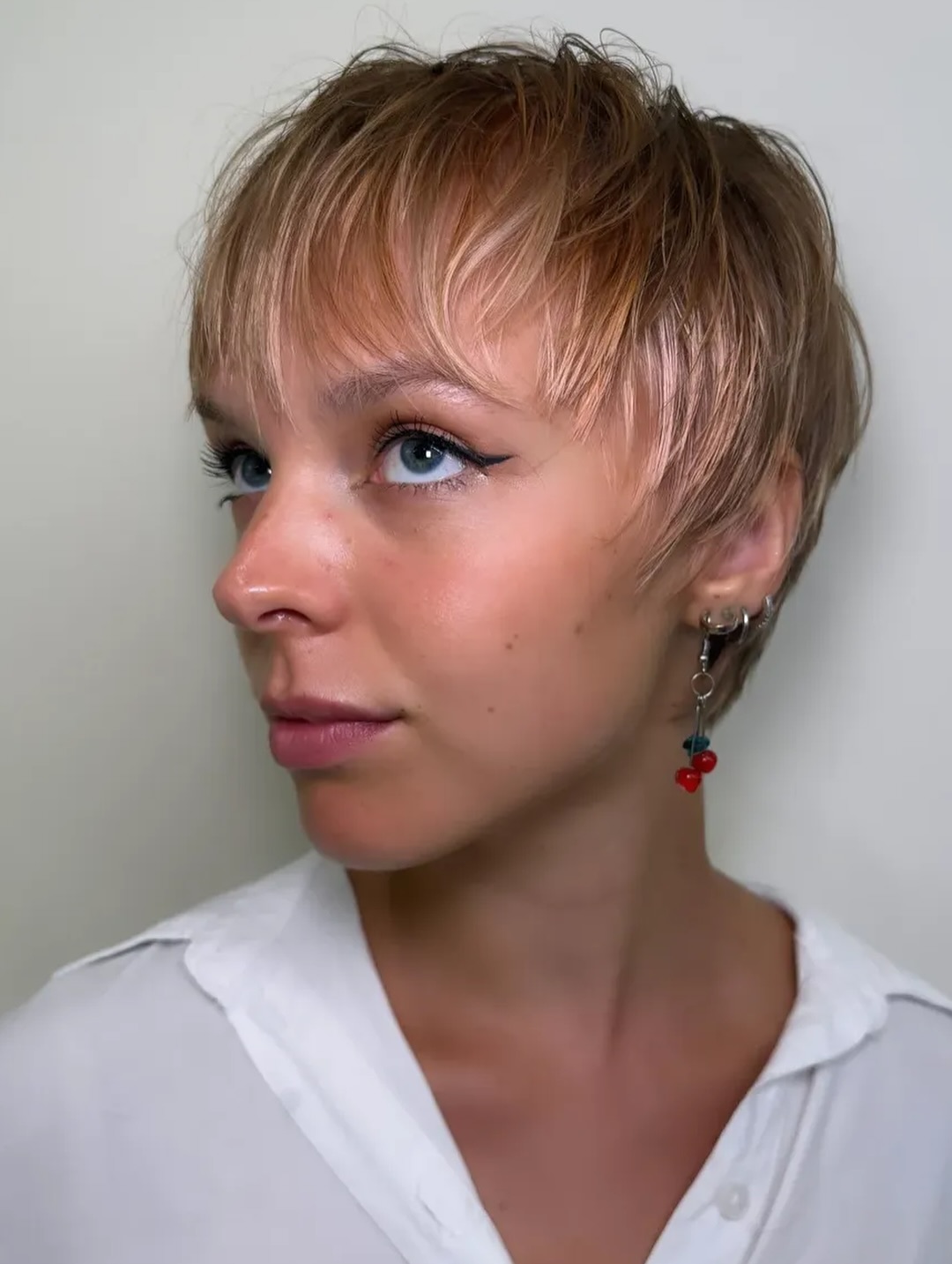 Caramel-Blonde Feathered Pixie with Delicate Fringe