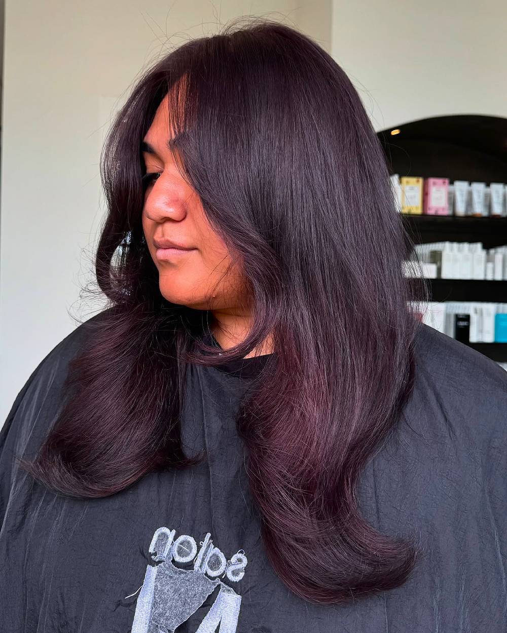 Sleek Cherry Chocolate Side-Swept Bob