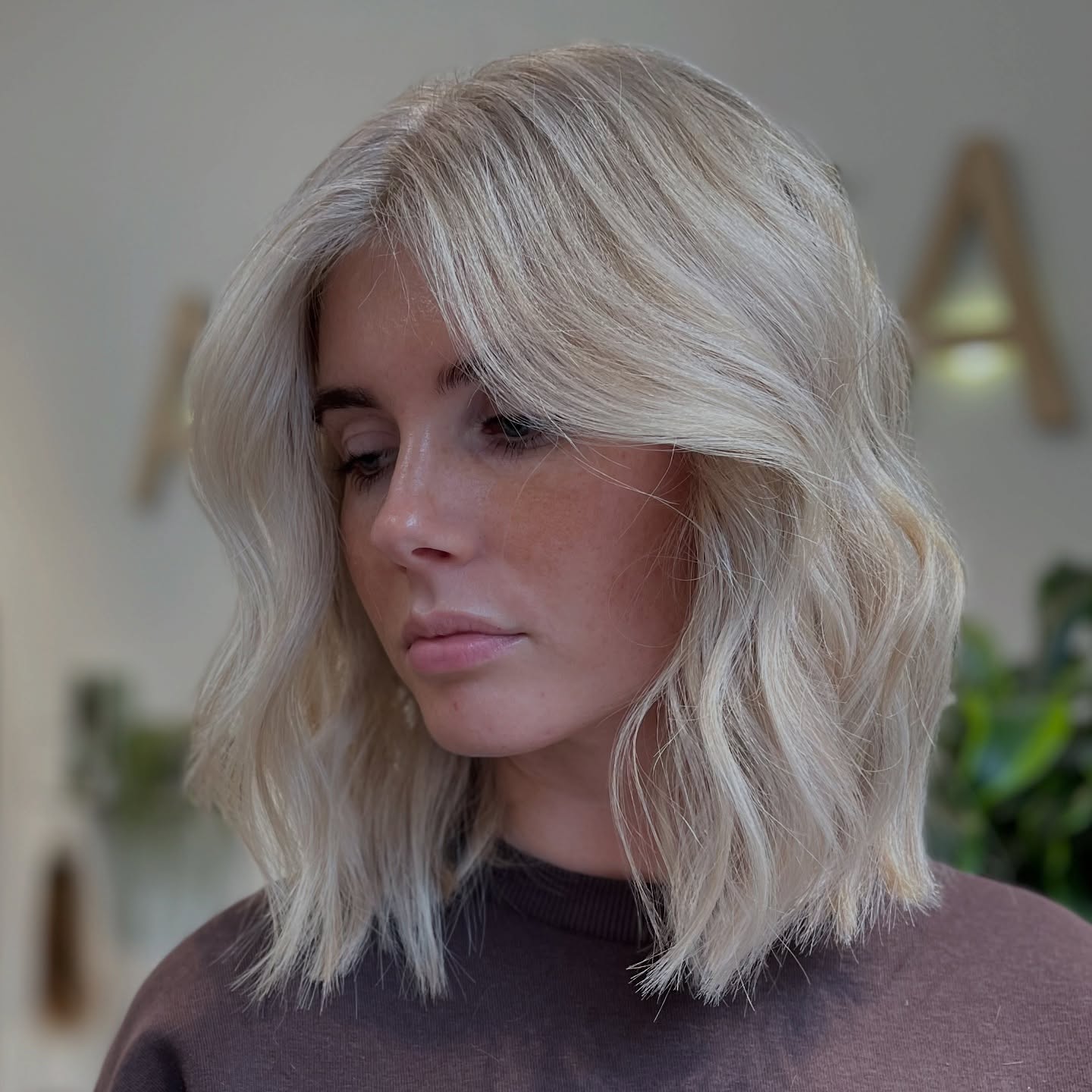 Softly Tousled Blonde Lob with Subtle Waves
