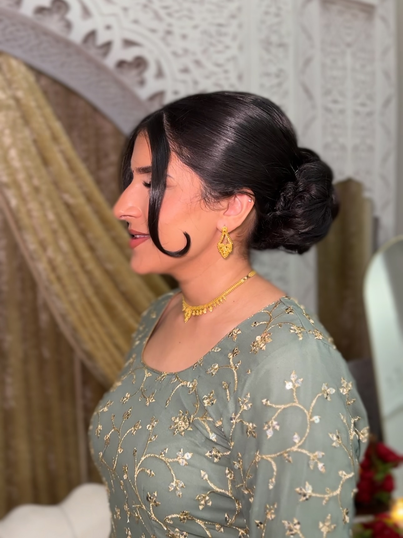 Classic Sleek Low Bun for Elegant Occasions