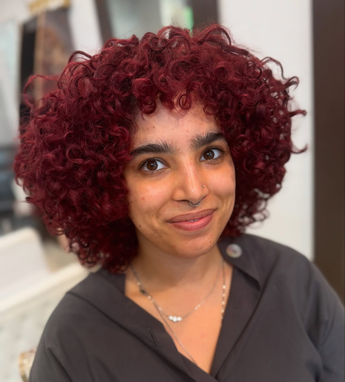 Deep-Burgundy-Curly-Bob-with-Glossy-Texture