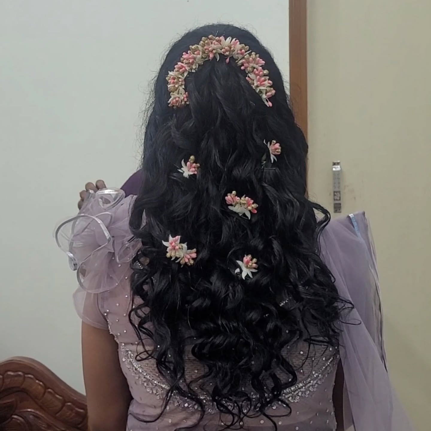 Floral-Adorned Cascading Curls for Saree Glamour