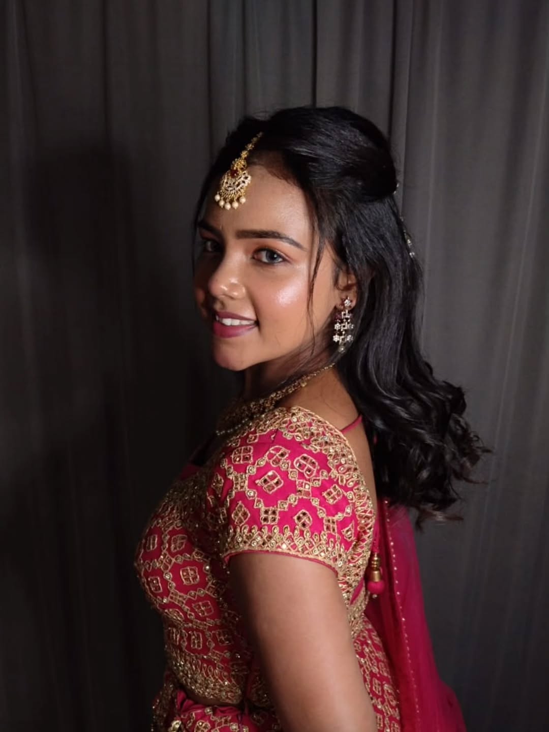Glamorous Soft Waves with Side Swept Bangs